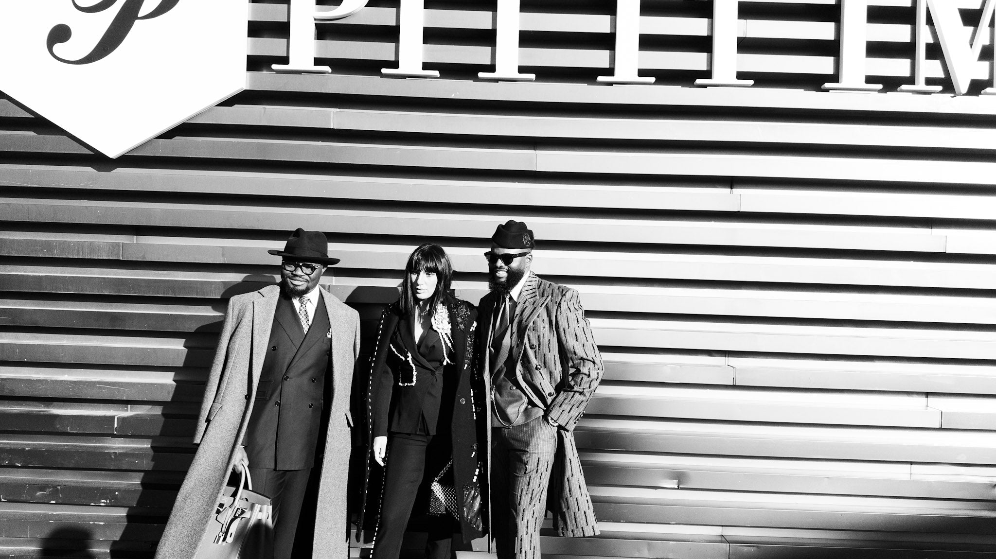 Pitti Uomo 107 at Fortezza De Basso, Florence where Pitti Uomo is held. Stylish fols gather around under the signage