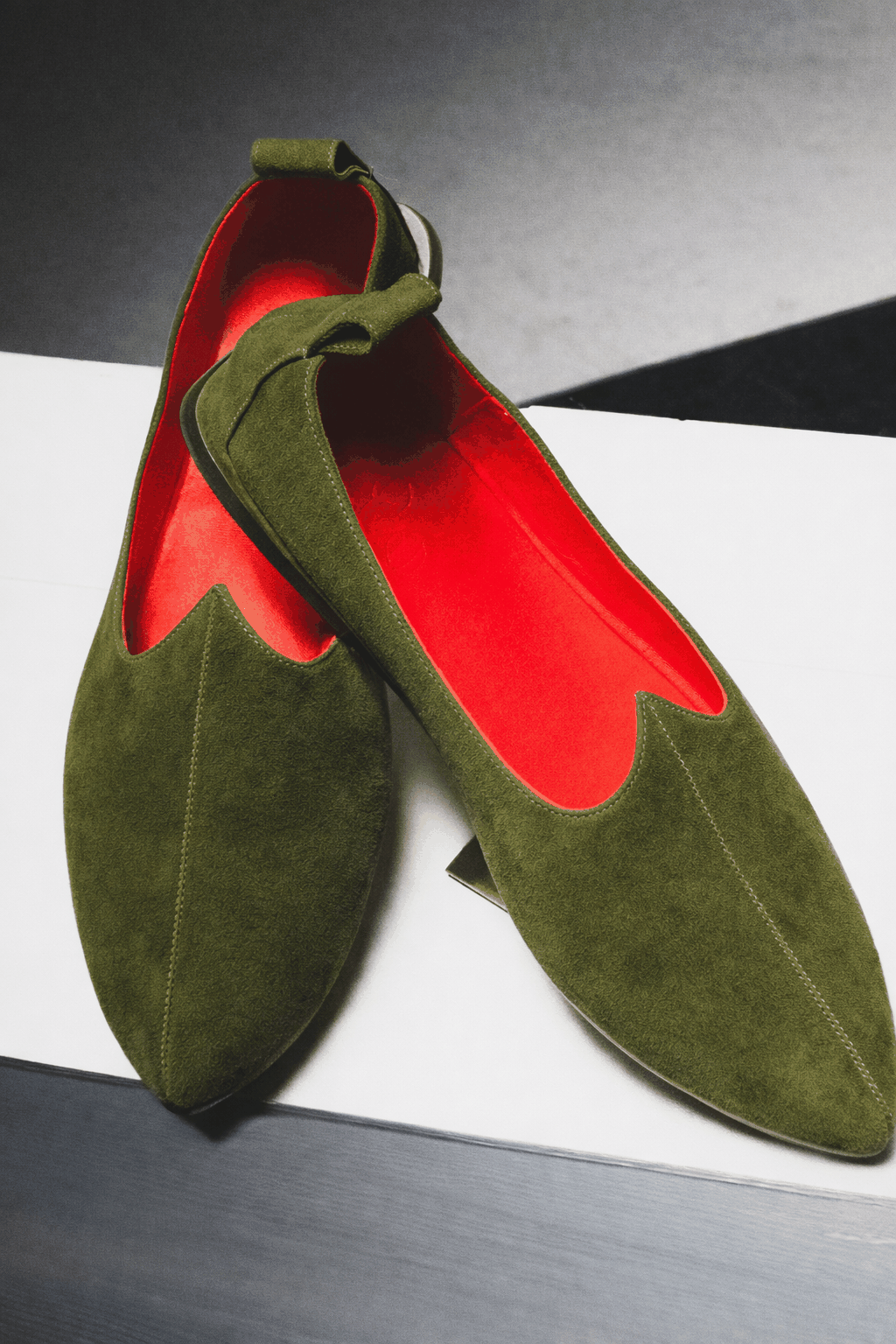 Green suede shoes with JOCO's signature red interior. Designer handmade Italian loafers