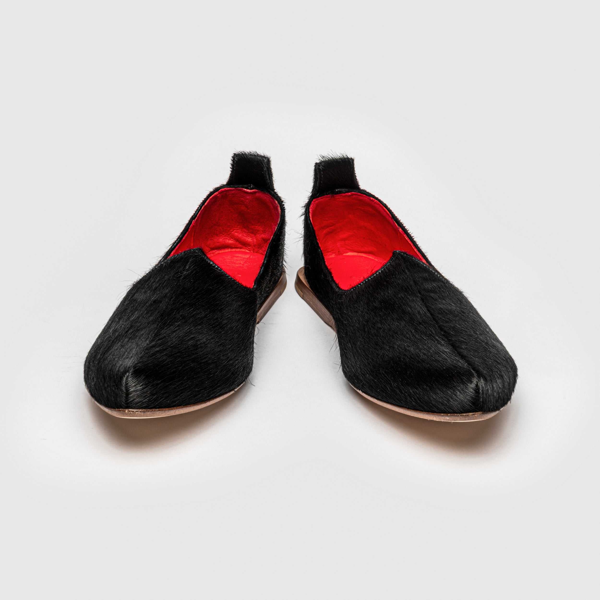 Black men's hair on leather pony hair mojri loafer handcrafted in Italy for elegant occasions